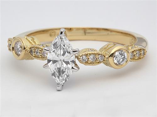 Gold 0.45 Marquise cut Diamond Ring With Sidestones