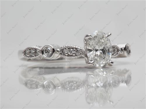 White Gold 0.61 Oval cut Side Stone Engagement Ring