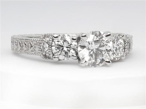 Platinum 0.72 Round cut Engagement Rings With Side Stones