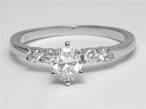 White Gold 0.55 Oval cut Engagement Ring With Sidestones