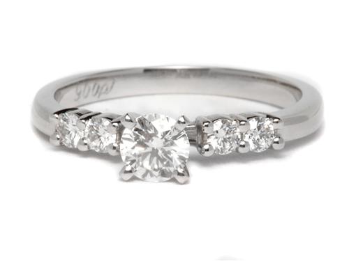 Platinum 0.32 Round cut Engagement Rings With Sidestones
