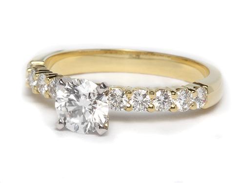 Gold 0.77 Round cut Side Stone Engagement Ring