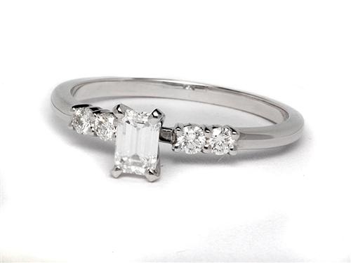 White Gold 0.50 Emerald cut Side Stone Engagement Rings