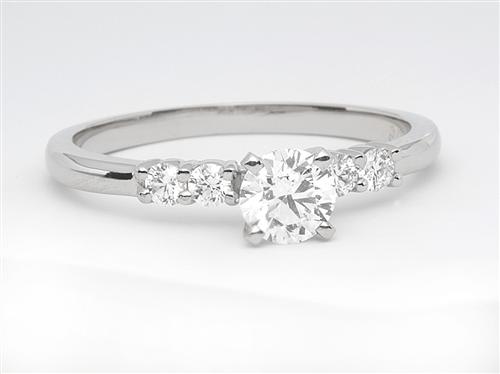 Platinum 0.51 Round cut Sidestone Engagement Ring