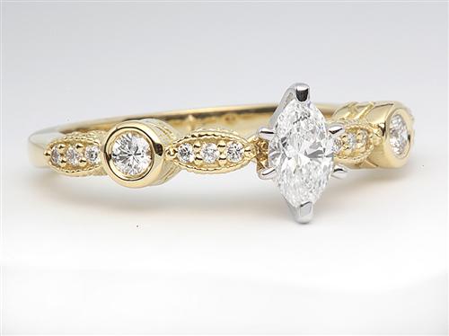 Gold 0.32 Marquise cut Engagement Ring With Sidestones
