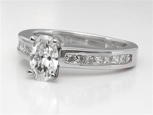 Platinum 0.74 Oval cut Side Stone Engagement Ring