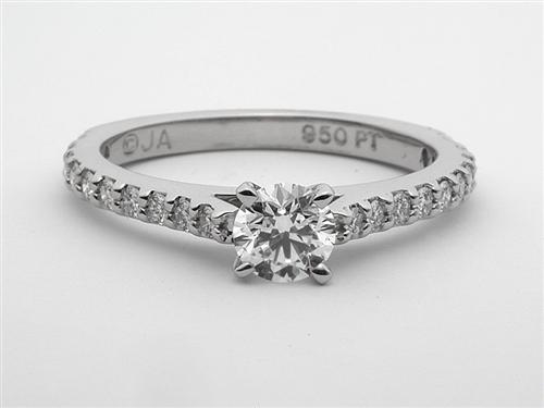 Platinum 0.43 Round cut Sidestone Engagement Ring