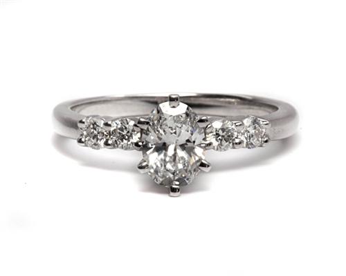 White Gold 0.51 Oval cut Diamond Rings With Side Stones