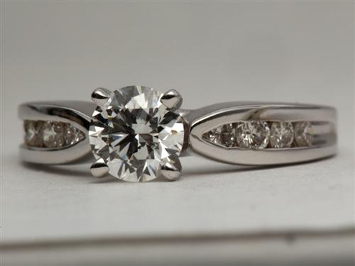 White Gold 0.65 Round cut Channel Set Diamond Band