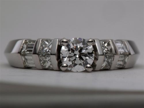 Platinum 0.45 Round cut Engagement Rings With Sidestones
