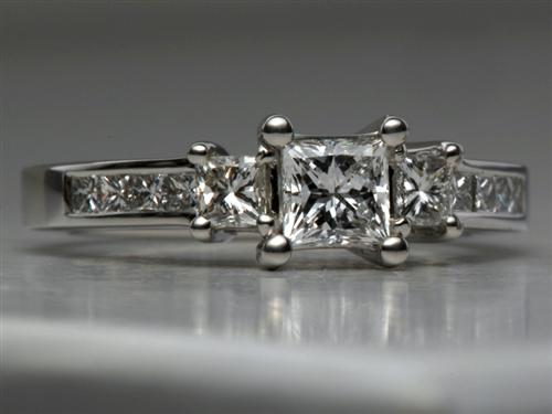 Platinum 0.54 Princess cut Sidestone Engagement Ring