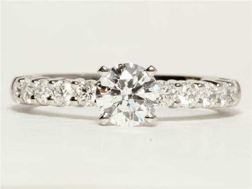 Platinum 0.71 Round cut Princess Cut Engagement Rings With Side Stones