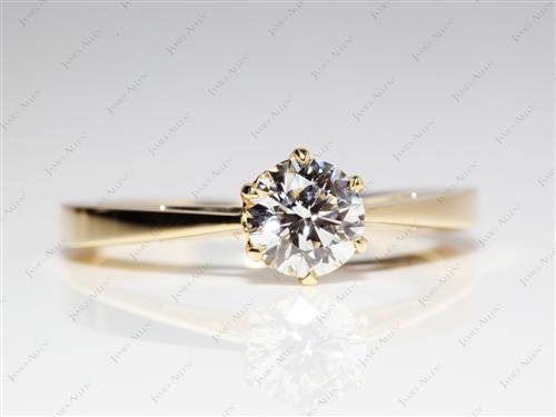 Gold 0.75 Round cut Solitaire